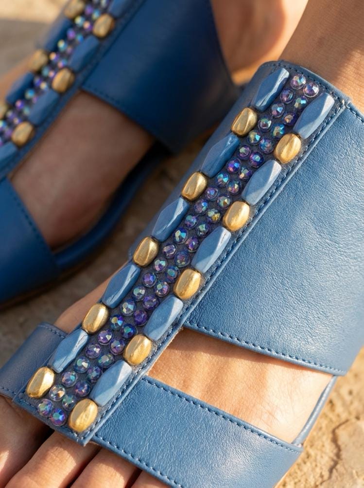 Iridescent Beads Bordered with matt Gold and Blue Beads with AB blue beads in center on DIY Self Adhesive Trim - Faraj Beading
